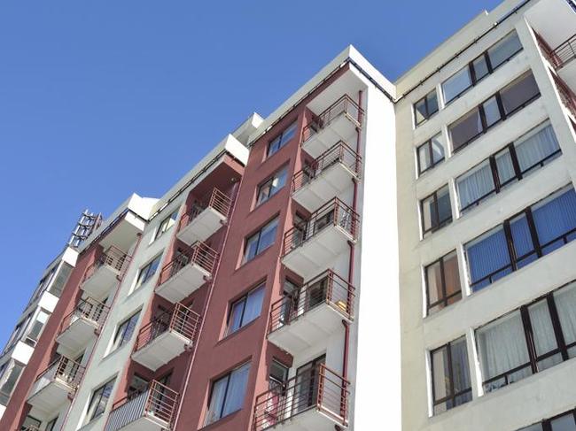 Facade of a modern and stylish multistorey apartment house.