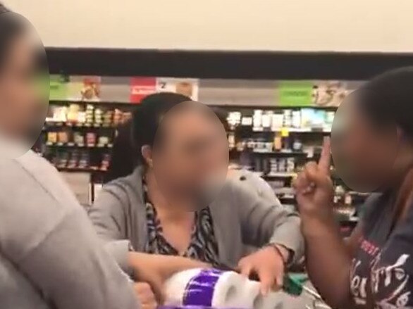 . Shoppers fight over toilet rolls at the height of the panic buying craze. Picture: Twitter