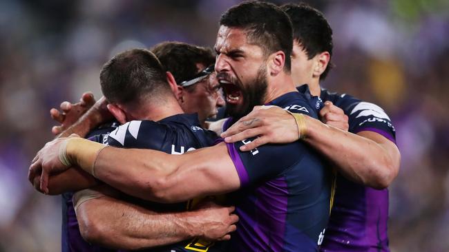 Jesse Bromwich celebrates a try.