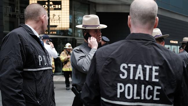 Police officers gather outside of the Time Warner Centre in New York. Picture: Getty Images.