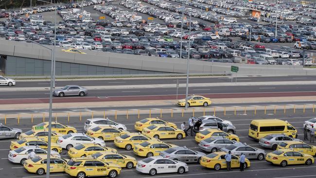 Taxis queue for passengers at Melbourne Airport. Picture: Jason Edwards