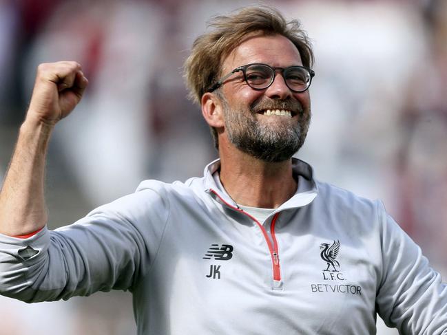 Liverpool manager Jurgen Klopp celebrates after the final whistle and winning 0-4 in the English Premier League soccer match against West Ham United at London Stadium, Sunday May 14, 2017. (Adam Davy/PA via AP)