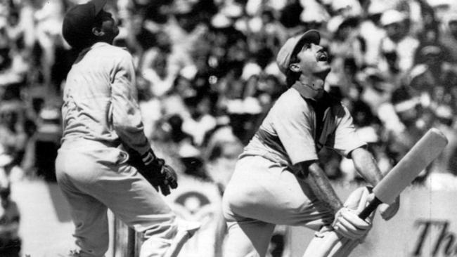 Batsman Wayne Phillips skies shot and is caught during an Australia v India one-day International at the MCG.