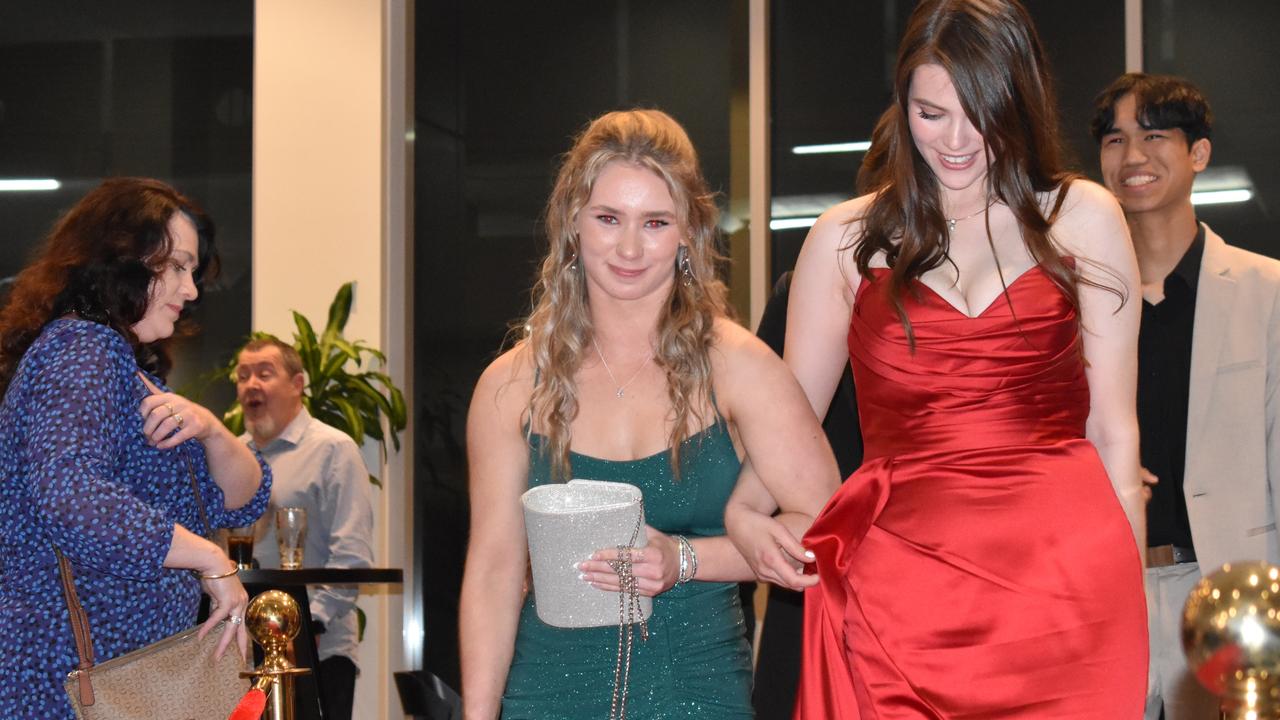 Maroochydore State High seniors walk into their 2022 formal.