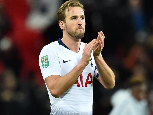 Tottenham Hotspur's English striker Harry Kane applauds the fans following the English League Cup semi-final first-leg football match between Tottenham Hotspur and Chelsea at Wembley Stadium in London, on January 8, 2019. - Tottenham won the first-leg 1-0. (Photo by Glyn KIRK / AFP) / RESTRICTED TO EDITORIAL USE. No use with unauthorized audio, video, data, fixture lists, club/league logos or 'live' services. Online in-match use limited to 120 images. An additional 40 images may be used in extra time. No video emulation. Social media in-match use limited to 120 images. An additional 40 images may be used in extra time. No use in betting publications, games or single club/league/player publications. /