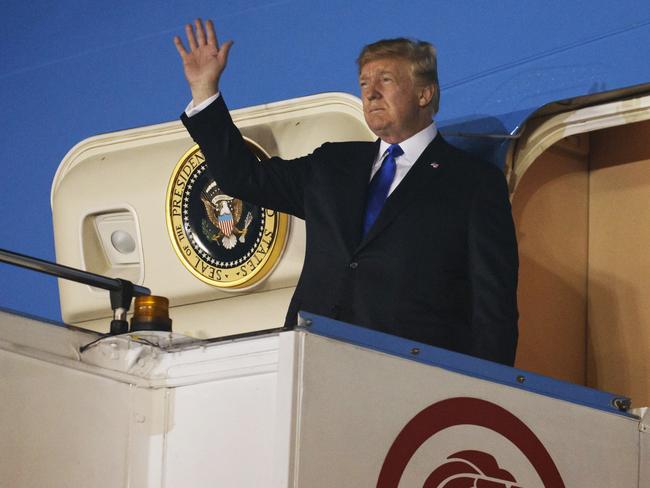 President Donald Trump arrives at Paya Lebar Air Base for a summit with North Korean leader Kim Jong-un. Picture: AP