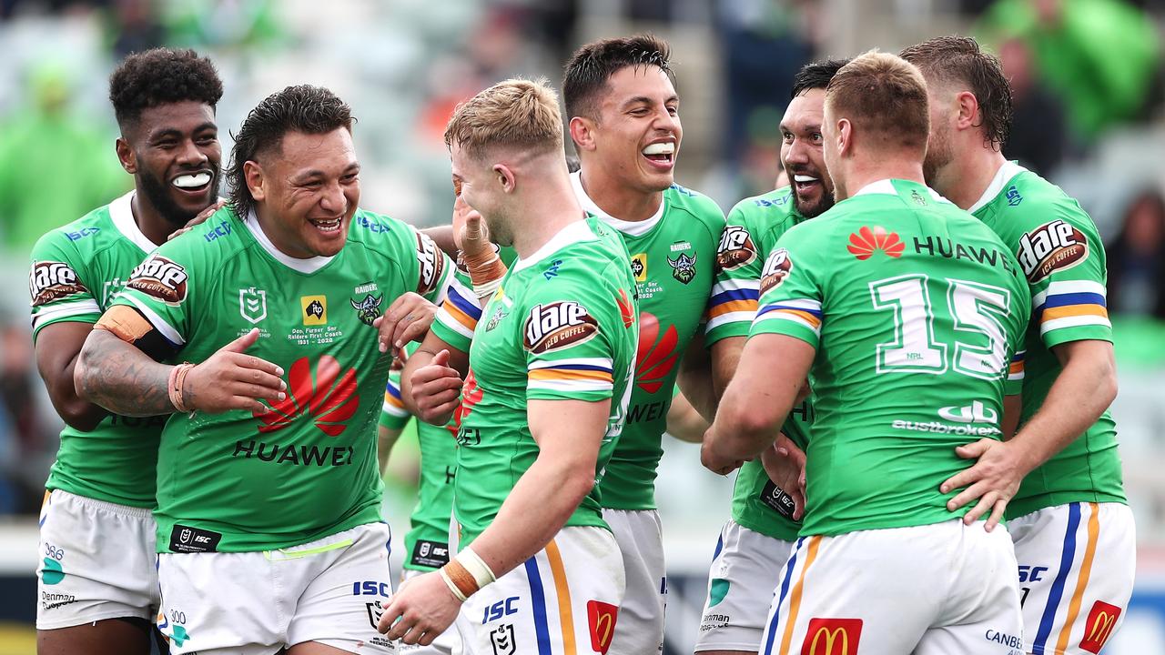 The Raiders celebrate a crucial win over the Warriors. (Photo by Cameron Spencer/Getty Images)