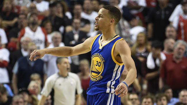 Stephen Curry #30 celebrates draining yet another 3 for the Golden State Warriors.