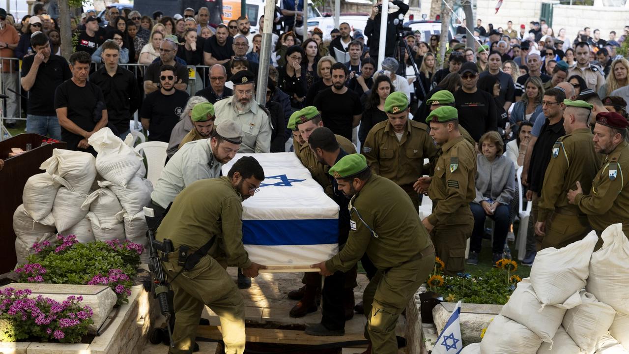 Israeli Soldiers carry the coffin of IDF soldier Sergeant Michael Ruzal during his funeral on May 6, 2024 in Rishon LeZion, Israel. (Photo by Amir Levy/Getty Images)