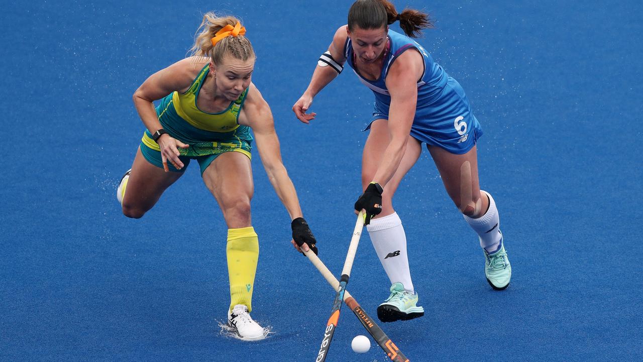 Australia’s Stephanie Kershaw battles for possession with Scotland’s Becky Ward in the Pool B match in Birmingham. Picture: Getty Images