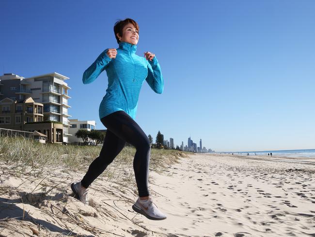 Gabriela Villavicencio training on the beach to run the Gold Coast marathon. Picture Glenn Hampson