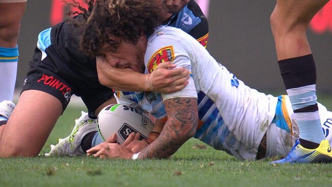 The moment Kevin Proctor allegedly bit Shaun Johnson’s arm. Picture: Fox League.