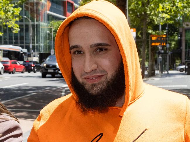 Sentence for suspected Mongols duo. (Black T Shirt) Abrahim El-Tawil, also 22, outside the County Court after he was spared jail time for an arson attack on a convenience store in Epping in August 2021. (Fluro Orange) Seckin Koc, 22, outside the County Court after he was spared jail time for an arson attack on a convenience store in Epping in August 2021.