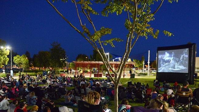 Playford locals enjoying an evening of free cinema at Town Park in Adelaide’s northern suburbs.