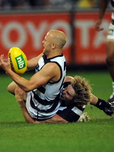 <p>Geelong v Collingwood. MCG. Dale Thomas tackles Gary Ablett Jr. Picture: Michael Dodge</p>