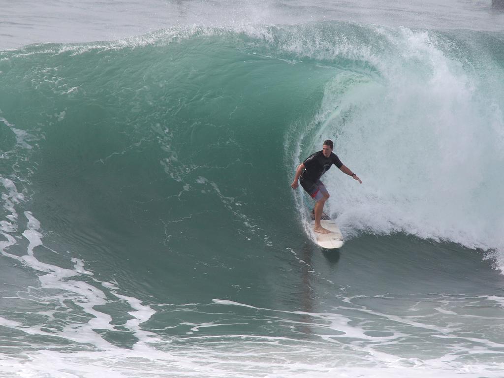 Surfers pictured enjoying good swell and near perfect waves at D-Bah. Picture: Mike Batterham