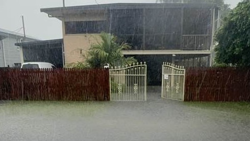 Water in Alley Street, Gordonvale earlier on Wednesday. Picture: Jane James