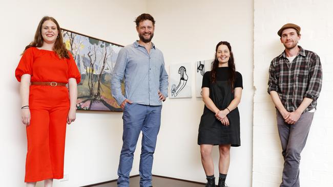 Artist Ben Quilty with three of the recipients of the Brett Whiteley Travelling Art Scholarship - Lily Platts, Dan Kyle and Emily Imeson. Picture: Jonathan Ng