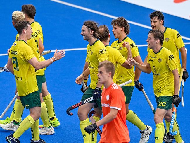 Australiaâs players celebrate after scoring a goal during the men's field hockey match between Australia and Netherlands in the FIH Hockey Pro League in Sydney on February 9, 2025. (Photo by Izhar KHAN / AFP) / -- IMAGE RESTRICTED TO EDITORIAL USE - STRICTLY NO COMMERCIAL USE --