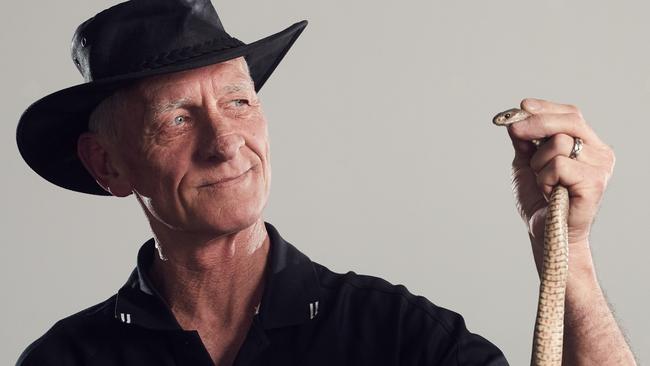 Rudy Della-Flora handling a snake. Picture: Matt Loxton