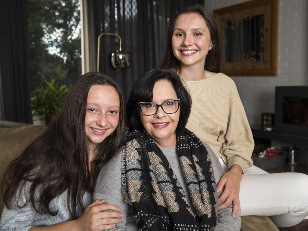 Jennifer Rix relaxes with her daughters Allyssa (left) and Samantha. Picture: Kevin Farmer