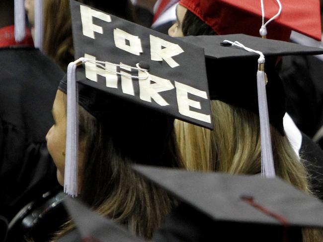 ADVANCE FOR RELEASE WEDNESDAY, SEPT. 14, 2011, AT 12:01 A.M. EDT - FILE - In this Saturday, Aug. 6, 2011 file picture, students attend graduation ceremonies at the University of Alabama in Tuscaloosa, Ala. The number of borrowers defaulting on federal student loans has jumped sharply, the latest indication that rising college tuition costs, low graduation rates and poor job prospects are getting more and more students over their heads in debt. The national two-year cohort default rate rose to 8.8 percent in 2009, from 7 percent in fiscal 2008, according to figures released Monday, Sept. 12, 2011 by the Department of Education. (AP Photo/Butch Dill)