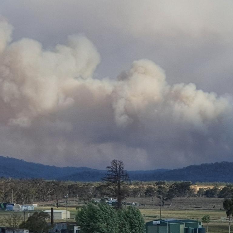 A potentially life-threatening blaze at Wallangarra is seen from the nearby town of Fletcher, as the fire takes off on Tuesday, October 31, 2023. Picture: Vanessa Smith