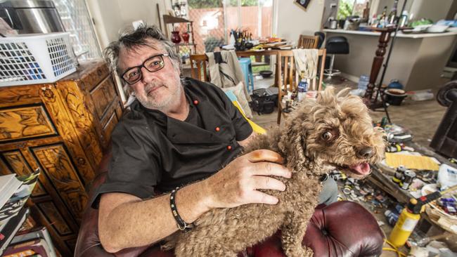 Ian Bartholomew, pictured with his dog Zeta, has developed a reputation for making odd cooking videos. Picture: Nev Madsen.