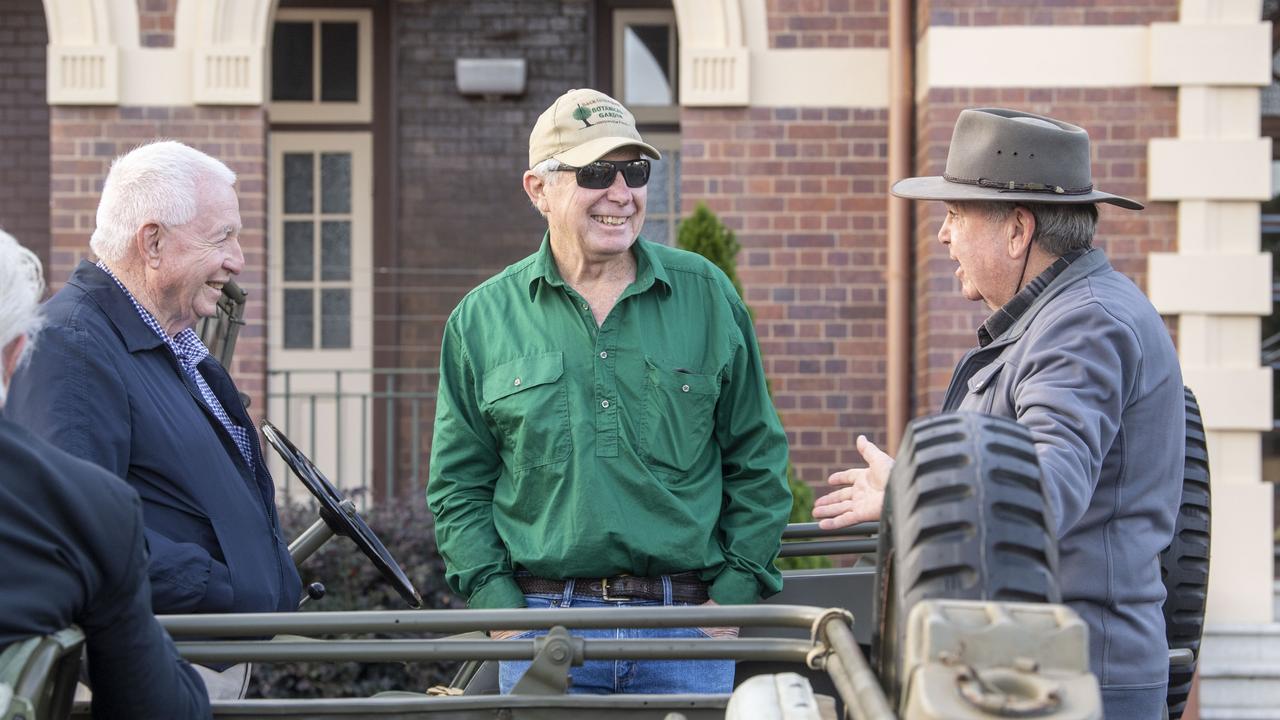 (from left) John Stipetich, Philip Tindall and Mike Berry share a story. Assembly in Neil St for the mid morning parade on ANZAC DAY. Tuesday, April 25, 2023. Picture: Nev Madsen.