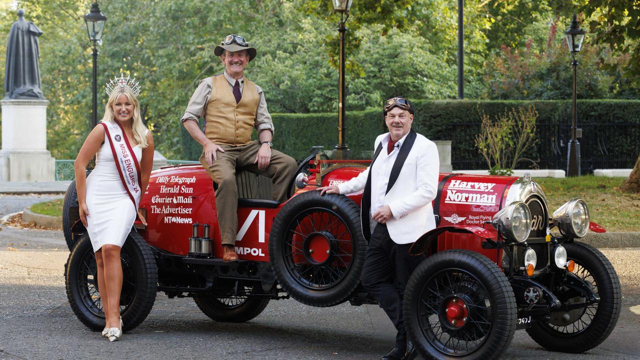 Miss England Milla Magee farewells the intrepid duo before their re-enactment of Birtles’ famous 1927 drive from London to Melbourne. Picture: Jamie Lorriman