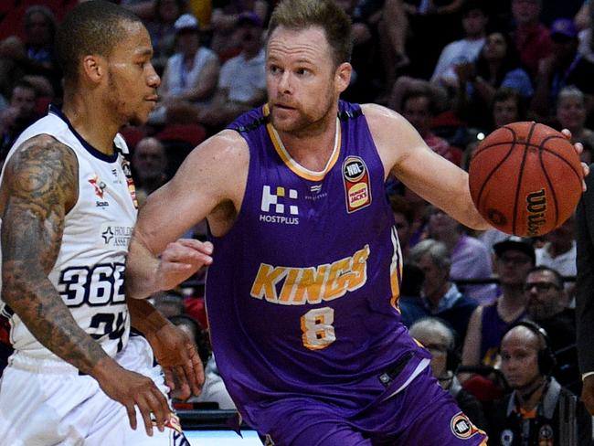 The Kings’ Brad Newley takes on the 36ers’ Jerome Randle. Picture: AAP