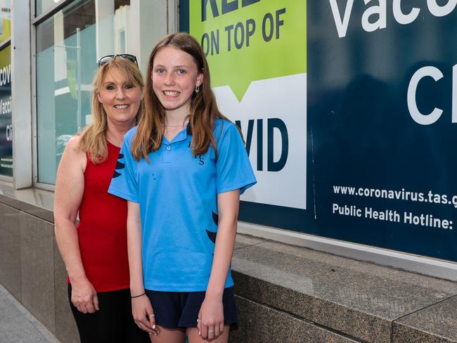 Michelle Earley with grand-daughter Bella Lovell, just outside the vaccination clinic in Hobart. Picture : Mireille Merlet