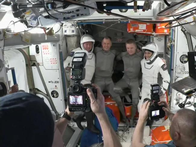 The astronauts before departing from the International Space Station. Picture: NASA/AFP