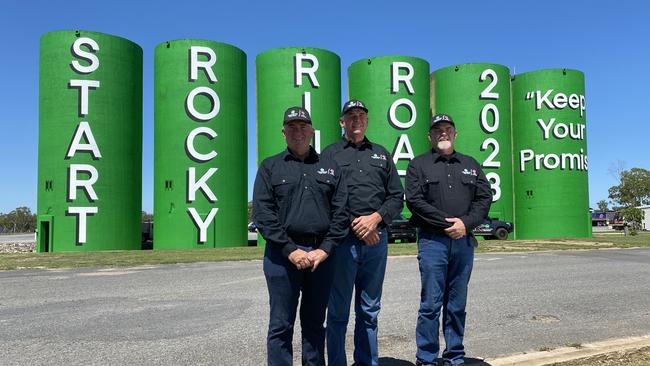 Grantley Jack, Jason Thomasson and Jack Trenaman from the Start Rockhampton Ring Road group in front of painted silos at Parkhurst.