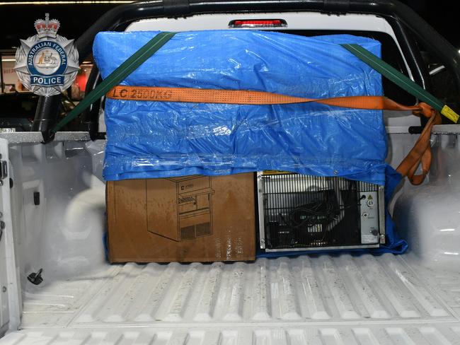 OP Merredin The AFP has dismantled an Australian criminal network allegedly importing and manufacturing hundreds of kilograms of cocaine under the direction of a Colombian organised crime syndicate.fridges allegedly containing drugs in courier's ute