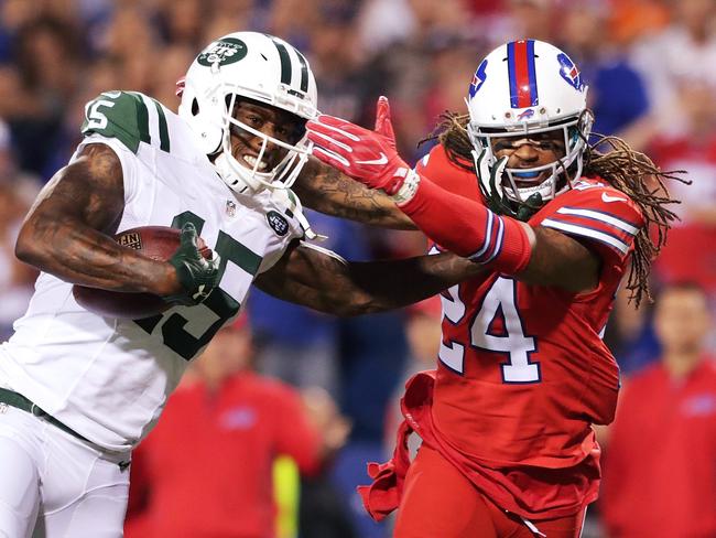 ORCHARD PARK, NY - SEPTEMBER 15: Brandon Marshall #15 of the New York Jets is tackled by Stephon Gilmore #24 of the Buffalo Bills resulting in putting Marshall out for the game during the first half at New Era Field on September 15, 2016 in Orchard Park, New York. Brett Carlsen/Getty Images/AFP == FOR NEWSPAPERS, INTERNET, TELCOS & TELEVISION USE ONLY ==
