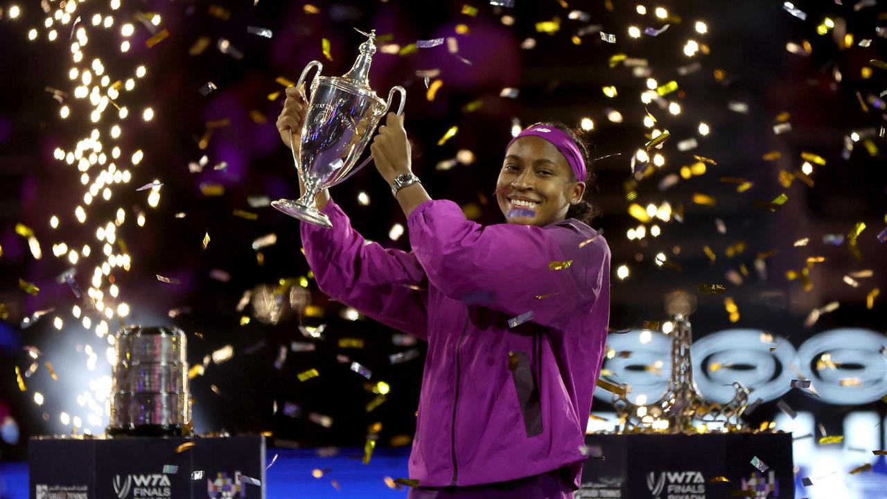 RIYADH, SAUDI ARABIA - NOVEMBER 09: Coco Gauff of the United States celebrates with the Billie Jean King trophy after her win against Qinwen Zheng of China in their Women's Singles Final match during the 2024 WTA Finals Riyadh as part of the Hologic WTA Tour at King Saud University Indoor Arena on November 09, 2024 in Riyadh, Saudi Arabia. (Photo by Matthew Stockman/Getty Images for WTA)