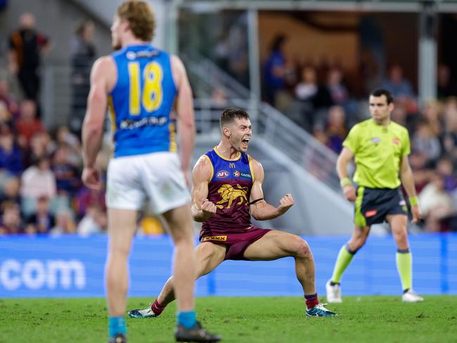 Josh Dunkley celebrates a goal during Brisbane’s QClash win. Picture: Russell Freeman/AFL Photos via Getty Images