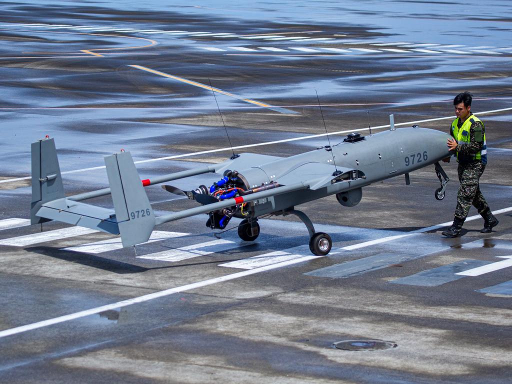 A Taiwanese military personnel moves an Albatross Tactical Unmanned Aircraft System during a live-fire drill.