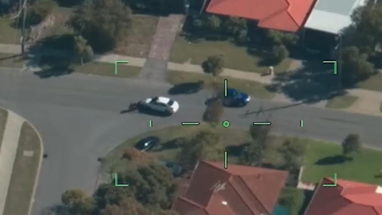 The boy can be seen in the vision rolling over the bonnet and roof of the white SUV, while his bike is thrown.