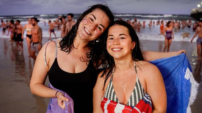 Salty Sips founders Nikita Trewartha and Lily Biggs, who started the dawn swimming group, at Henley Beach. Picture: Mike Burton.