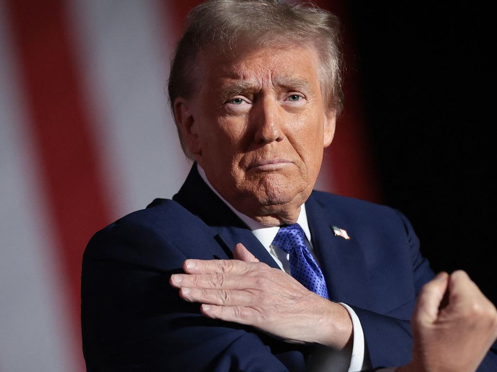 LATROBE, PENNSYLVANIA - OCTOBER 19: Republican presidential nominee, former U.S. President Donald Trump, gestures to the crowd as he concludes a campaign rally on October 19, 2024, in Latrobe, Pennsylvania. There are 17 days remaining until the U.S. presidential election, which will take place on Tuesday, November 5, 2024.   Win McNamee/Getty Images/AFP (Photo by WIN MCNAMEE / GETTY IMAGES NORTH AMERICA / Getty Images via AFP)