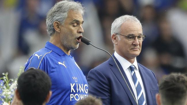 Andrea Bocelli sings beside Leicester manager Claudio Ranieri.