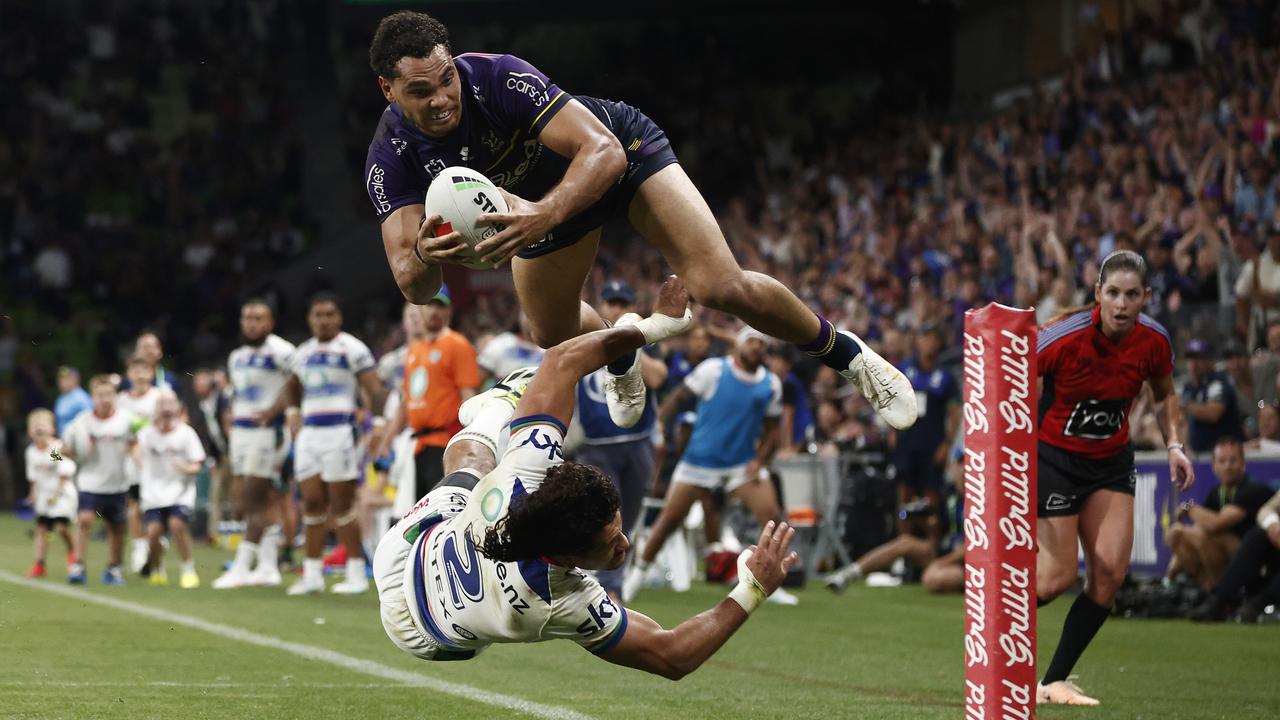 Xavier Coates of the Storm scores the match winning try. Photo by Daniel Pockett/Getty Images.