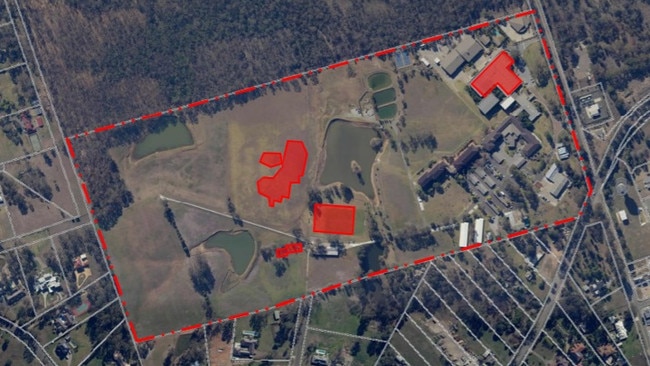 Aerial view of site showing proposed alterations shaded in red. A film studio, office building and a replica Biblical site are proposed at 12-14 Zouch Rd, Denham Court. Picture: Planning documents