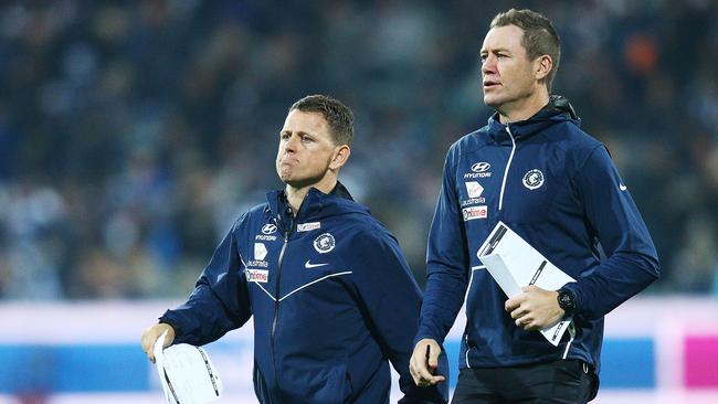 John Barker with Brendon Bolton back in 2018. Picture: Getty Images