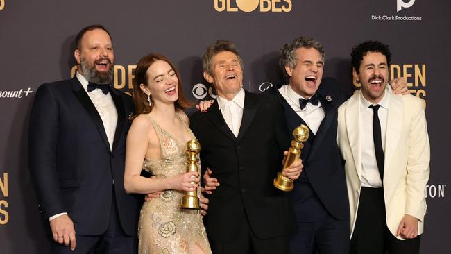 Yorgos Lanthimos, Emma Stone, Willem Dafoe, Mark Ruffalo, and Ramy Youssef, winners of the Best Picture, Musical or Comedy award for Poor Things. Picture: Getty Images