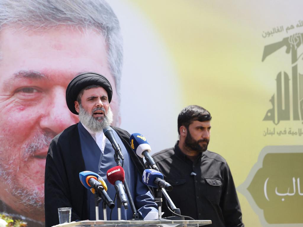 Senior Hezbollah official Hashem Safieddine addresses mourners during the funeral of commander Taleb Abdallah who was killed in June. Picture: AFP.