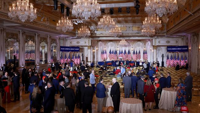 People wait for the arrival of Donald Trump during an event at his Mar-a-Lago home on Tuesday. Picture: AFP