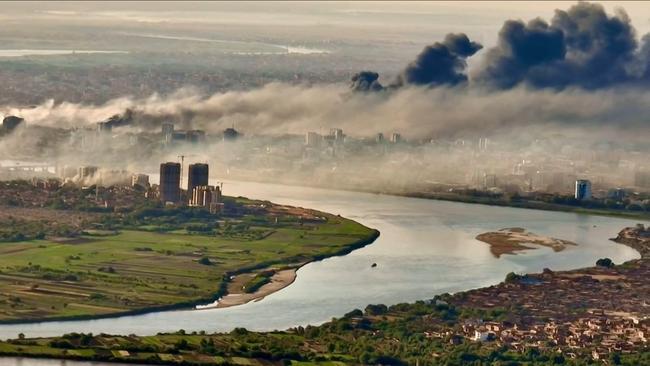 A plume hangs over conflict-riven Khartoum. Picture: AFP